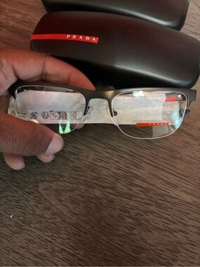 Prada Men's Semi-Rimless Glasses in Black with Red Accents